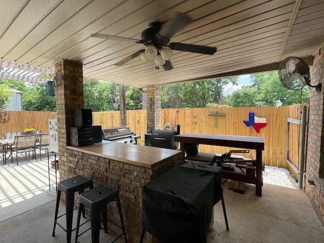 102 Dogwood Cir, Daingerfield, TX 75638 - fenced backyard with a grill and a patio area