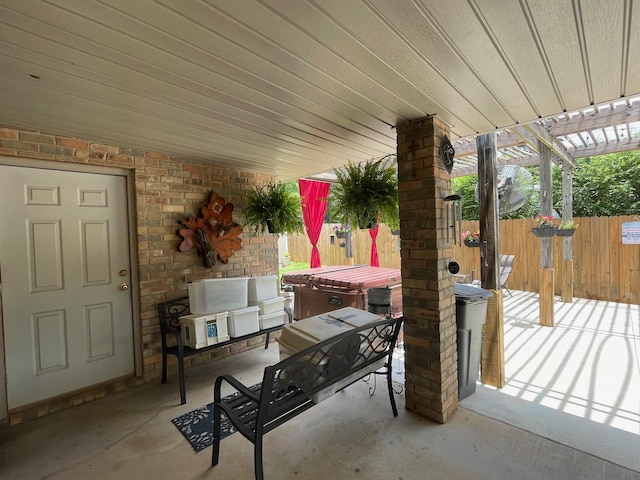102 Dogwood Cir, Daingerfield, TX 75638 - view of patio featuring a hot tub and a pergola