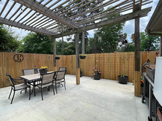 102 Dogwood Cir, Daingerfield, TX 75638 - fenced backyard with a patio, a pergola, and outdoor dining area