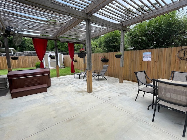 102 Dogwood Cir, Daingerfield, TX 75638 - fenced backyard featuring a hot tub, a patio area, and a pergola