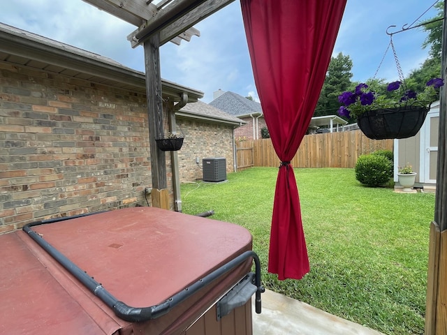 102 Dogwood Cir, Daingerfield, TX 75638 - view of yard featuring a hot tub and central AC