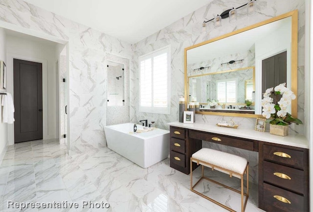 4820 Strada St, Celina, TX 75078 - bathroom featuring tile walls, healthy amount of natural light, a soaking tub, vanity, and marble finish floors