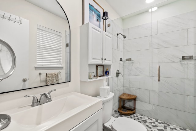 7805 Eagle Trl, Dallas, TX 75238 - bathroom with a shower stall, toilet, and vanity