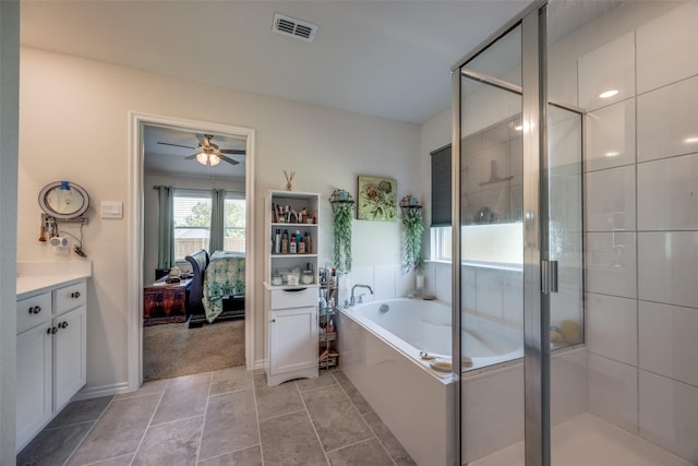 525 Brandy Ln, Tom Bean, TX 75489 - ensuite bathroom with a garden tub, ceiling fan, vanity, and a stall shower