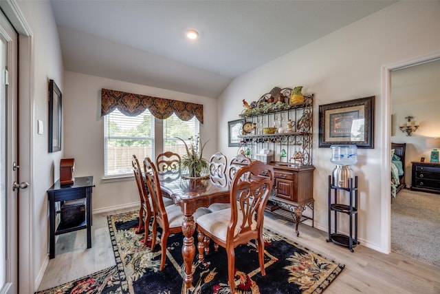 525 Brandy Ln, Tom Bean, TX 75489 - dining room with vaulted ceiling, baseboards, and light wood finished floors