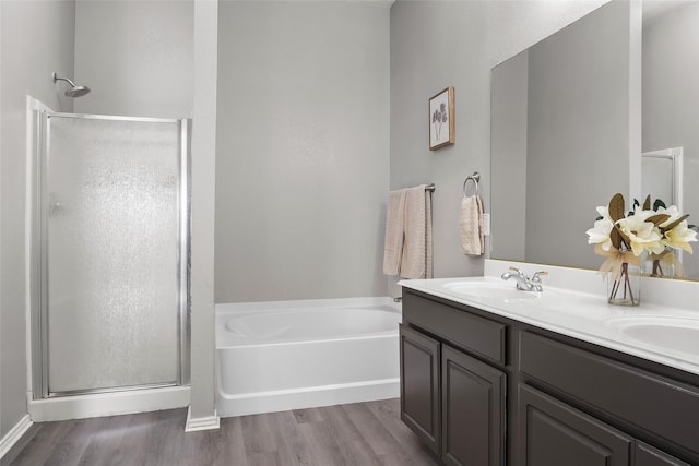 1433 Wind Dancer Trl, Fort Worth, TX 76131 - full bathroom featuring a shower stall, wood finished floors, a garden tub, and double vanity