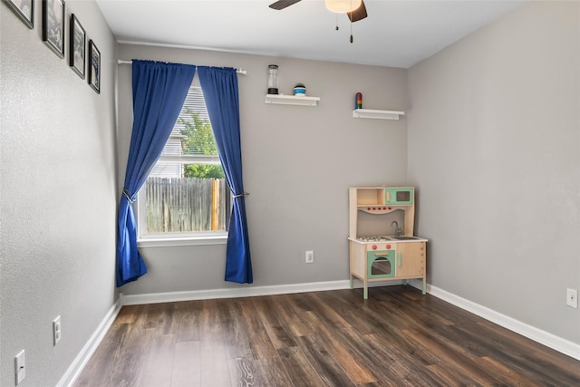 1433 Wind Dancer Trl, Fort Worth, TX 76131 - spare room featuring wood finished floors, a ceiling fan, and baseboards