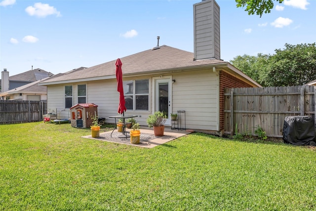 1433 Wind Dancer Trl, Fort Worth, TX 76131 - back of property featuring a chimney and a patio area