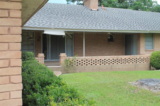 914 Stillmeadow Rd, Dallas, TX 75232 - doorway to property with roof with shingles, brick siding, and a chimney