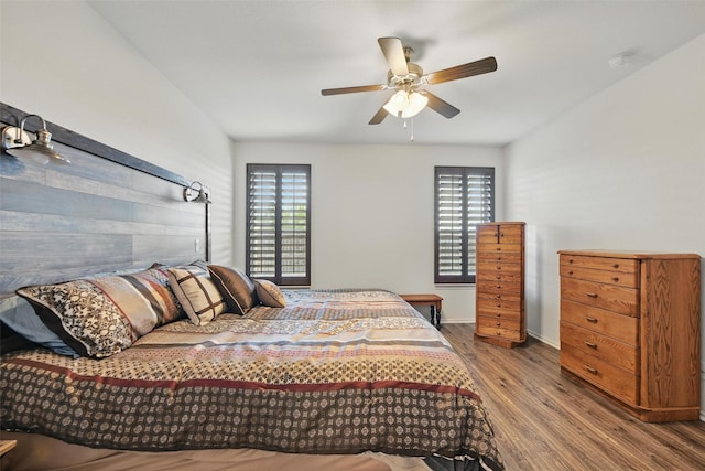 11512 Starlight Ranch Trl, Fort Worth, TX 76052 - bedroom with wood finished floors, ceiling fan, and baseboards