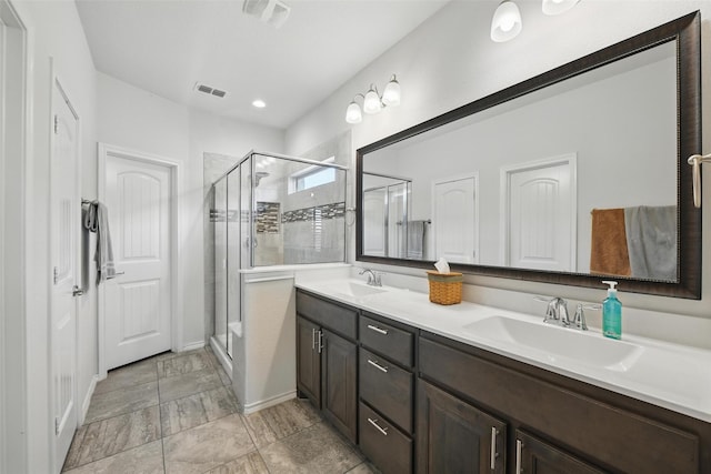 11512 Starlight Ranch Trl, Fort Worth, TX 76052 - full bathroom with a stall shower, double vanity, and baseboards