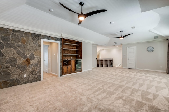 805 Cross Ln, Southlake, TX 76092 - unfurnished living room with ceiling fan, light carpet, lofted ceiling, baseboards, and bar