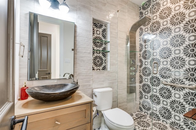 805 Cross Ln, Southlake, TX 76092 - full bath with tile walls, toilet, vanity, and tiled shower