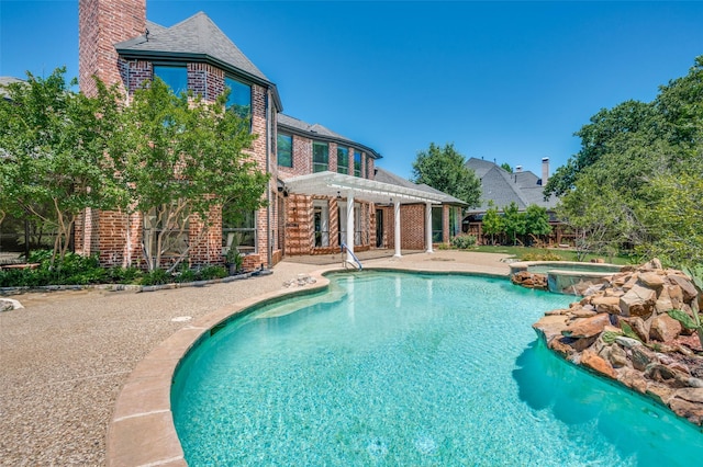 805 Cross Ln, Southlake, TX 76092 - view of swimming pool featuring a pergola, a patio area, and a pool with connected hot tub