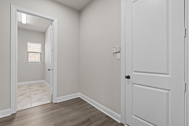 7913 Heritage Palms Trl, Mckinney, TX 75070 - corridor featuring baseboards and dark wood-type flooring
