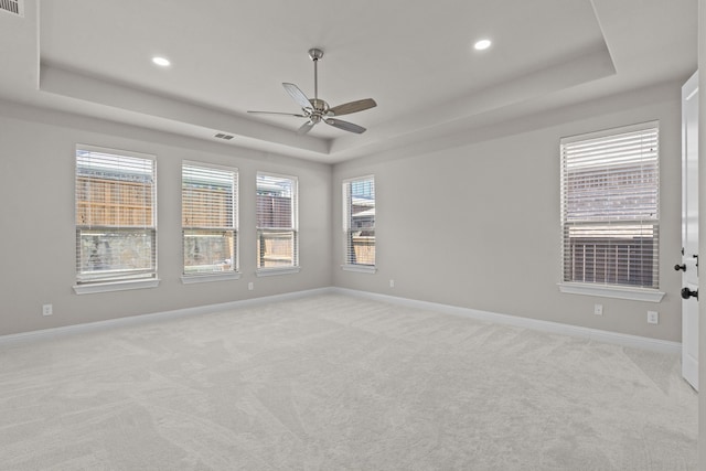 7913 Heritage Palms Trl, Mckinney, TX 75070 - unfurnished room featuring a raised ceiling, ceiling fan, light carpet, baseboards, and recessed lighting