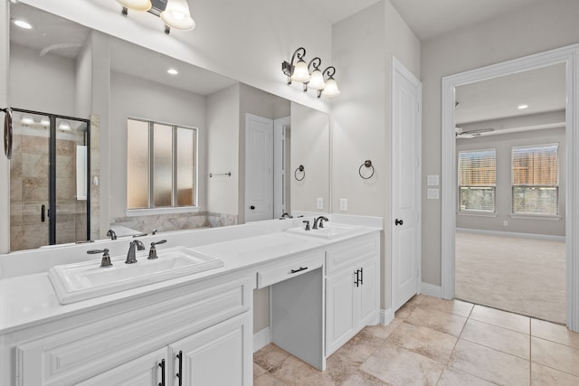 7913 Heritage Palms Trl, Mckinney, TX 75070 - full bathroom featuring double vanity, a shower stall, baseboards, tile patterned flooring, and recessed lighting