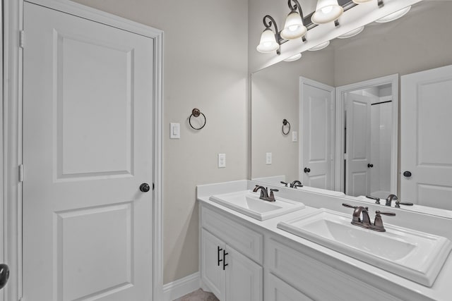 7913 Heritage Palms Trl, Mckinney, TX 75070 - bathroom with double vanity and baseboards