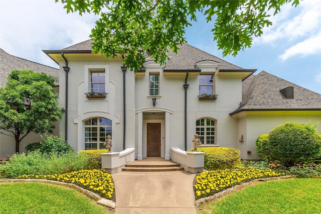 297 Ridgemont Dr, Heath, TX 75126 - french country home with stucco siding and a shingled roof