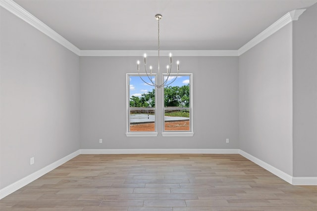 833 Haley, Springtown, TX 76082 - spare room featuring ornamental molding, a chandelier, light wood-style flooring, and baseboards