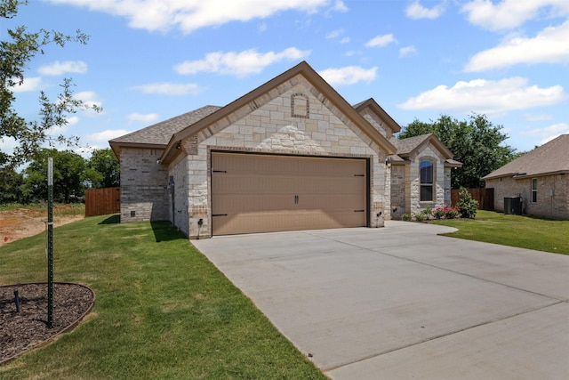 833 Haley, Springtown, TX 76082 - french provincial home featuring a garage, stone siding, concrete driveway, and roof with shingles