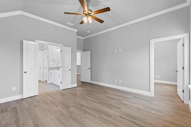 833 Haley, Springtown, TX 76082 - unfurnished bedroom featuring ornamental molding, light wood finished floors, baseboards, connected bathroom, and ceiling fan
