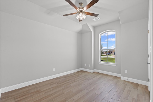 833 Haley, Springtown, TX 76082 - spare room with light wood-type flooring, a ceiling fan, and baseboards