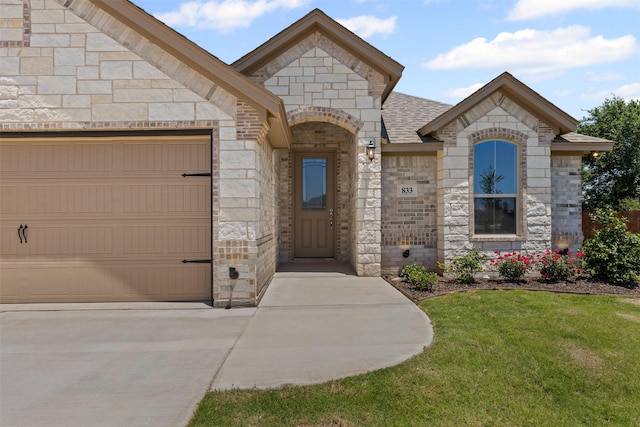 833 Haley, Springtown, TX 76082 - view of front facade with driveway, a garage, stone siding, a front yard, and a shingled roof