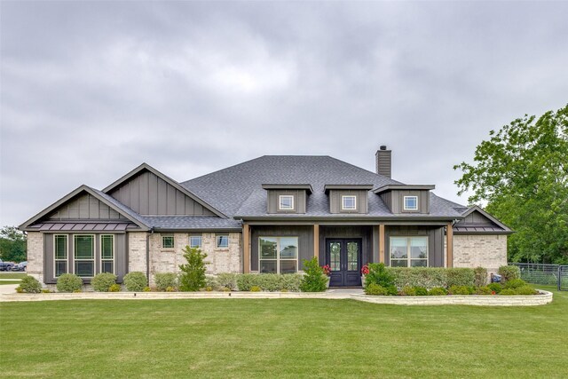 40 Lorene Dr, Van Alstyne, TX 75495 - craftsman-style house featuring french doors, a chimney, brick siding, board and batten siding, and roof with shingles