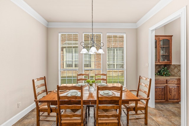 15372 Mountain View Ln, Frisco, TX 75035 - dining area featuring a chandelier, plenty of natural light, crown molding, and baseboards
