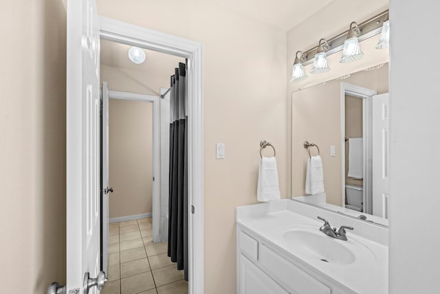 15372 Mountain View Ln, Frisco, TX 75035 - full bath with vanity, tile patterned floors, and a shower with shower curtain