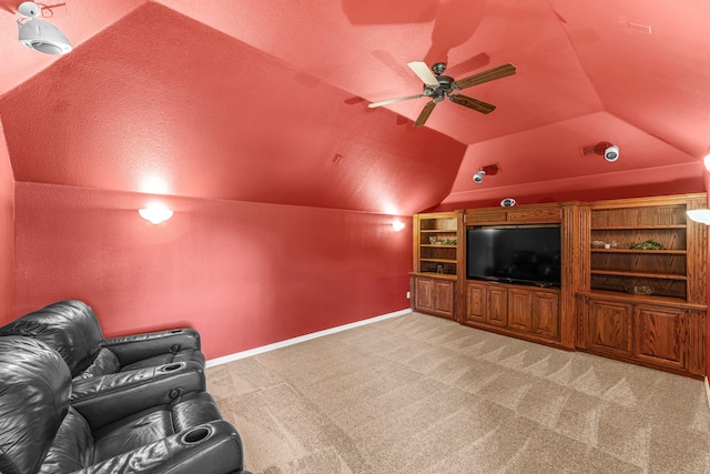 15372 Mountain View Ln, Frisco, TX 75035 - home theater room with light carpet, lofted ceiling, a ceiling fan, and baseboards