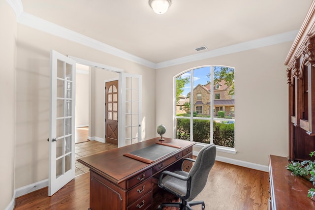 15372 Mountain View Ln, Frisco, TX 75035 - home office featuring french doors, baseboards, ornamental molding, and wood finished floors