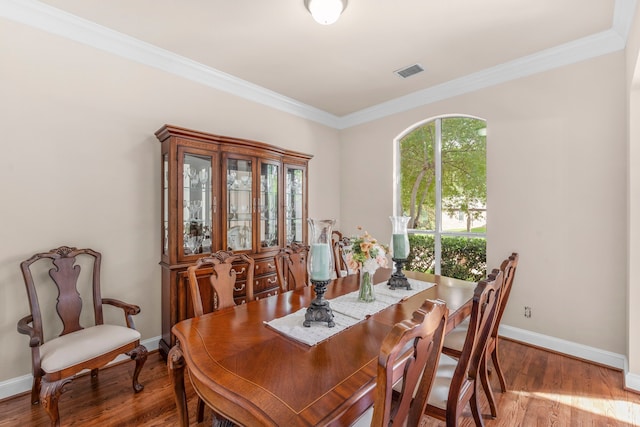 15372 Mountain View Ln, Frisco, TX 75035 - dining area with baseboards, ornamental molding, and wood finished floors