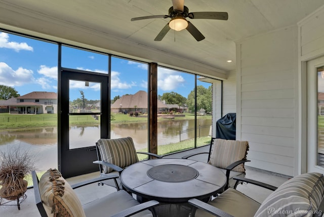 2087 Sand Crest Dr, Shreveport, LA 71118 - sunroom featuring a water view, ceiling fan, outdoor dining area, and a residential view