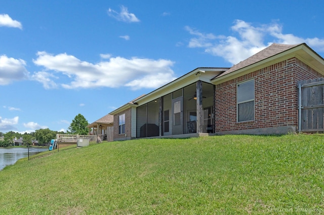 2087 Sand Crest Dr, Shreveport, LA 71118 - rear view of house with brick siding, a sunroom, and ceiling fan