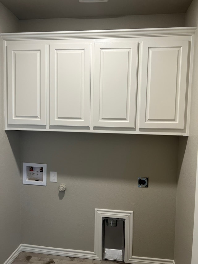 554 Calla Lily Dr, Tolar, TX 76476 - laundry area with cabinet space, washer hookup, hookup for an electric dryer, hookup for a gas dryer, and baseboards