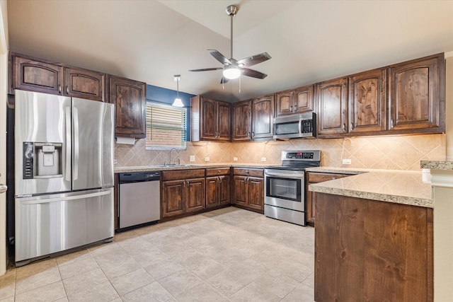 3007 Glenwood Ct, Aubrey, TX 76227 - kitchen featuring appliances with stainless steel finishes, a ceiling fan, a sink, tasteful backsplash, and light countertops