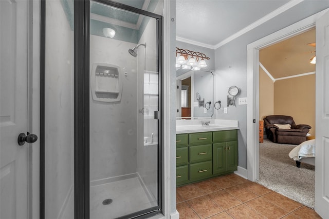 10513 Rayburn Way, Waco, TX 76708 - bathroom featuring ornamental molding, tile patterned floors, a stall shower, and vanity