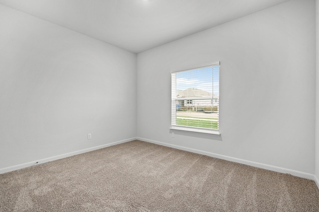 409 Gib Woodall Dr, Venus, TX 76084 - carpeted empty room featuring baseboards