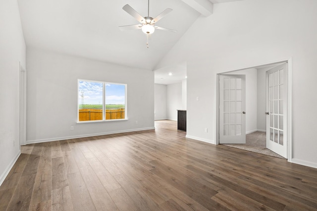 409 Gib Woodall Dr, Venus, TX 76084 - unfurnished living room featuring french doors, beam ceiling, ceiling fan, wood finished floors, and high vaulted ceiling