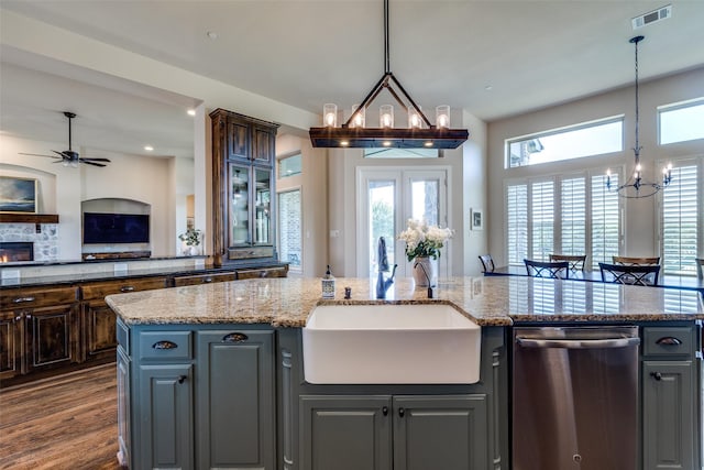 4540 Honeyvine Ln, Prosper, TX 75078 - kitchen with a sink, dishwasher, a chandelier, open floor plan, and ceiling fan
