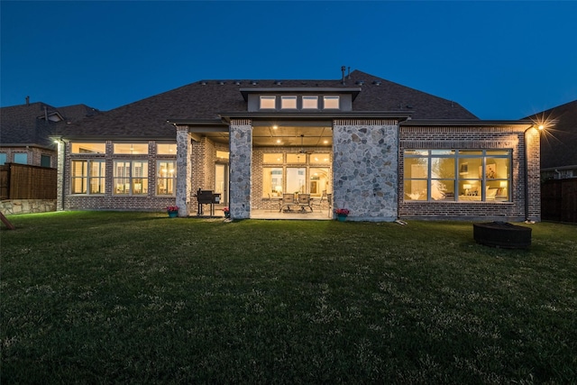 4540 Honeyvine Ln, Prosper, TX 75078 - rear view of house with a patio area, brick siding, and roof with shingles