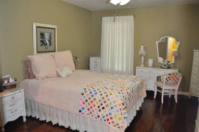 1405 Rolling Hills Dr, Graham, TX 76450 - bedroom with wood finished floors and a ceiling fan