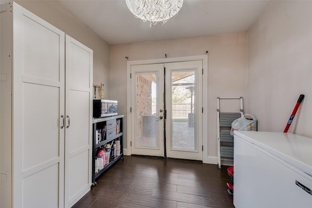 921 Granite Ln, Desoto, TX 75115 - doorway to outside with french doors, dark wood-type flooring, baseboards, and a chandelier