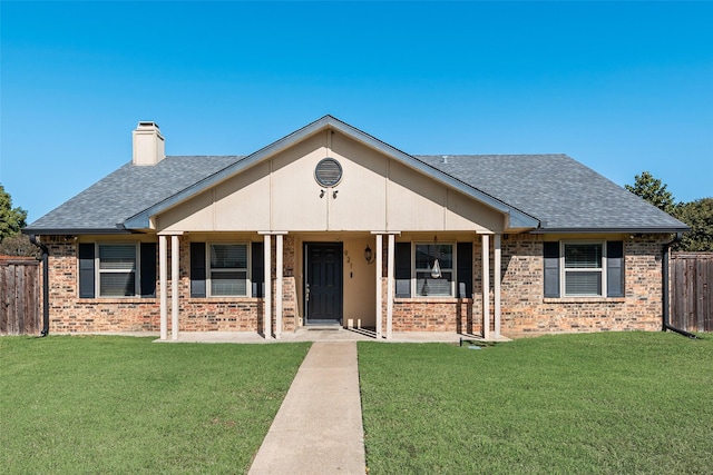 921 Granite Ln, Desoto, TX 75115 - view of front of house with brick siding, a shingled roof, a chimney, and covered porch