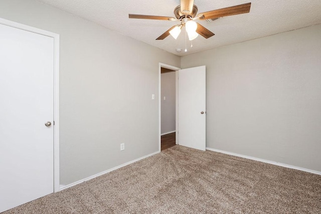5907 Cohoke Dr, Arlington, TX 76018 - unfurnished bedroom with carpet flooring, ceiling fan, and baseboards