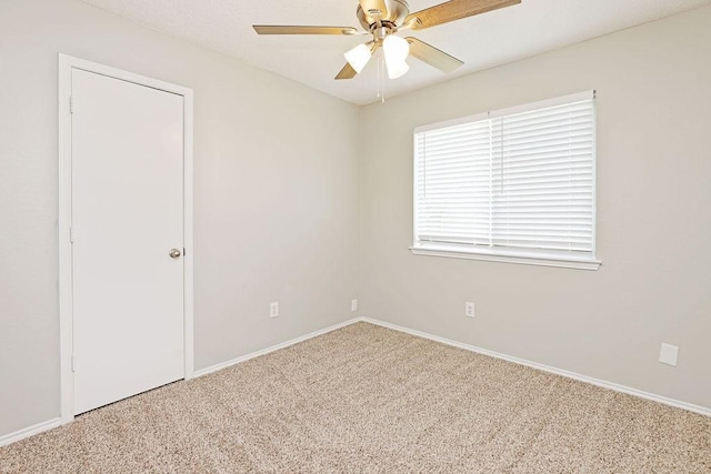 5907 Cohoke Dr, Arlington, TX 76018 - carpeted spare room with ceiling fan and baseboards