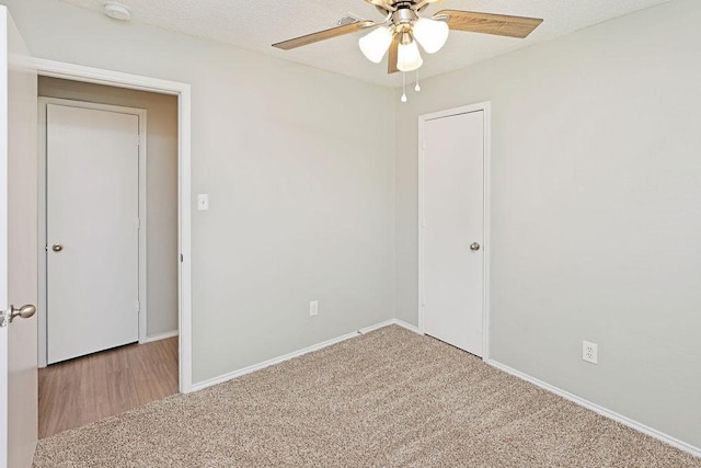 5907 Cohoke Dr, Arlington, TX 76018 - empty room featuring ceiling fan, a smoke detector, carpet floors, and baseboards