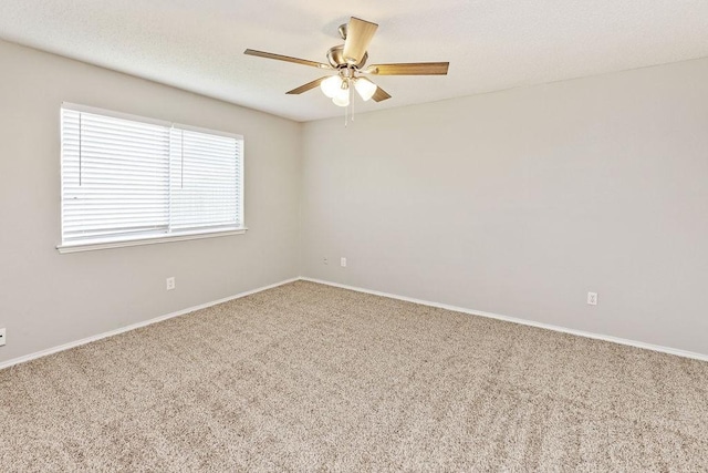 5907 Cohoke Dr, Arlington, TX 76018 - spare room featuring carpet floors, ceiling fan, and baseboards